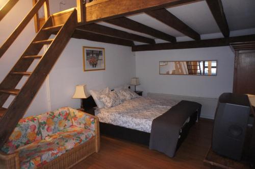 Giường trong phòng chung tại apartements Stegelshof