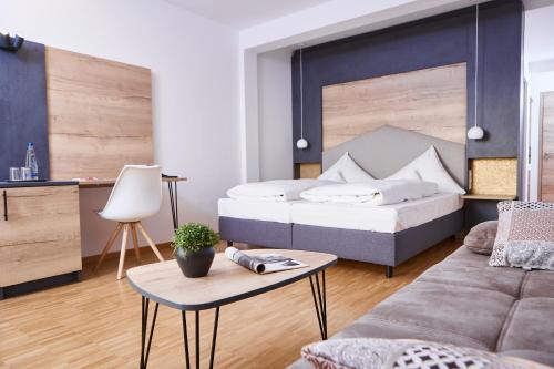 Ένα ή περισσότερα κρεβάτια σε δωμάτιο στο Rock&Chill Hotel Falter