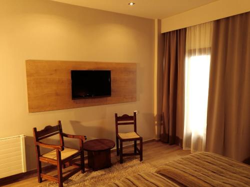 TV a/nebo společenská místnost v ubytování Anemolia Mountain Resort