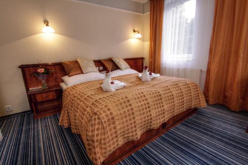Katil atau katil-katil dalam bilik di Spa & Wellness Hotel Harmonie