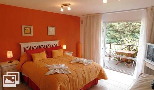 Ένα ή περισσότερα κρεβάτια σε δωμάτιο στο Complejo Solvang