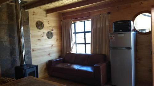 Kuchyň nebo kuchyňský kout v ubytování HelChiloé Cabañas