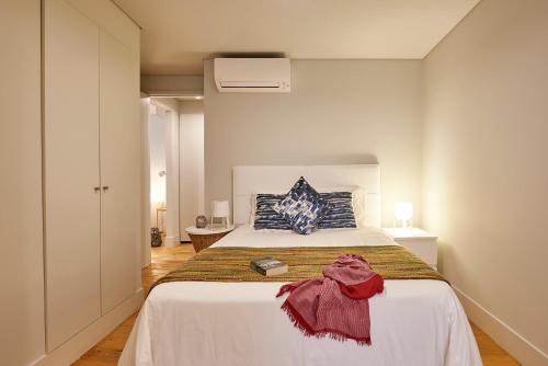 Кровать или кровати в номере Modern Apartment Bica dos Olhos