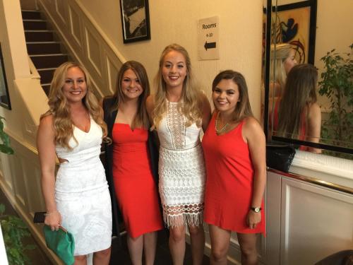 a group of four women standing next to each other at Hendham House in Manchester