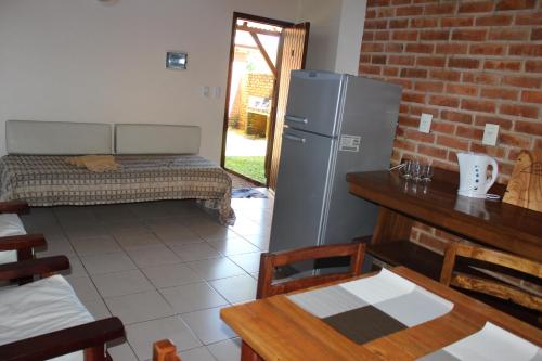 Η κουζίνα ή μικρή κουζίνα στο Un Lugar Hotel Cabañas