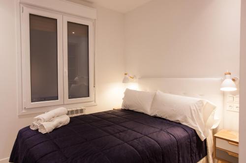 Postel nebo postele na pokoji v ubytování Baps Apartaments 2