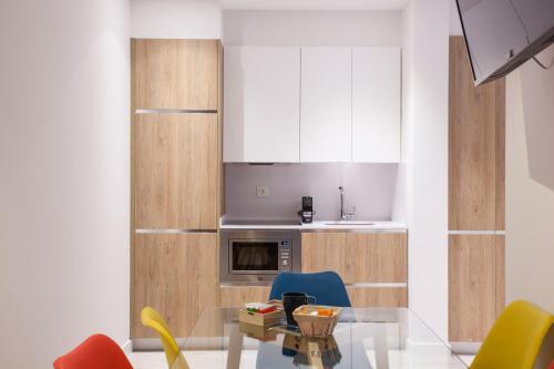 Kuchyň nebo kuchyňský kout v ubytování Baps Apartaments 2
