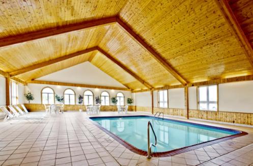The swimming pool at or near Americas Best Value Inn-Thief River Falls
