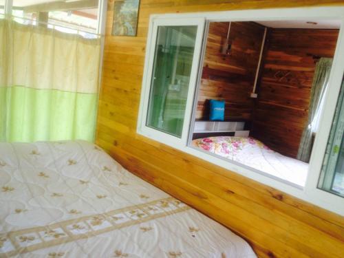 Ένα ή περισσότερα κρεβάτια σε δωμάτιο στο Ariya Garden Home