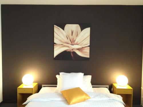 Cama o camas de una habitación en Au Boeuf Rouge