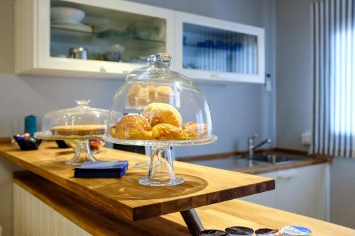 a plate of pastries on a counter in a kitchen at L'Approdo Hotel in Cesenatico