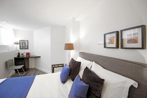 Ένα ή περισσότερα κρεβάτια σε δωμάτιο στο Guesthouse Prinsencanal 1