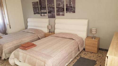 Posteľ alebo postele v izbe v ubytovaní villa sul mare a Chia
