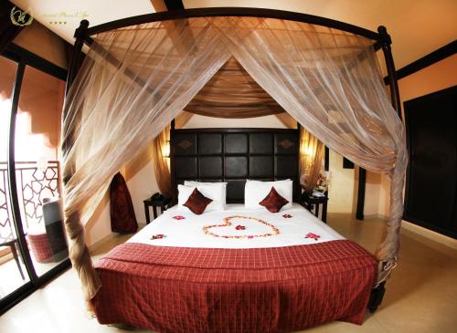 Postel nebo postele na pokoji v ubytování Hotel Imperial Plaza & Spa