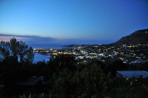 a view of the city at night at Sweetposeidon in Ischia