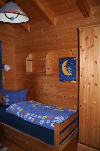 Ένα ή περισσότερα κρεβάτια σε δωμάτιο στο Ferienhaus Weil
