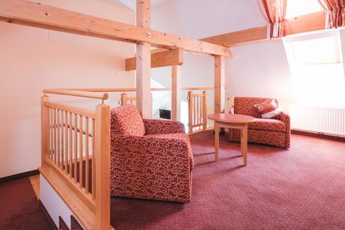 Istumisnurk majutusasutuses Hotel am Marktplatz - Landgasthof Wratschko - Gamlitz