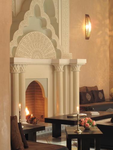 Posezení v ubytování Riad Le Perroquet Bleu Suites & Spa