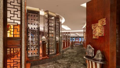 a room with many different types of items on display at The Reverie Saigon Residential Suites in Ho Chi Minh City