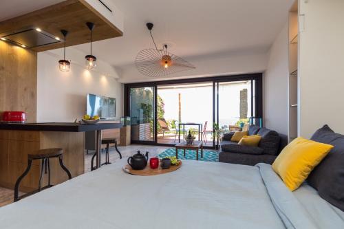 Postel nebo postele na pokoji v ubytování Résidence Vue Mer Cannes