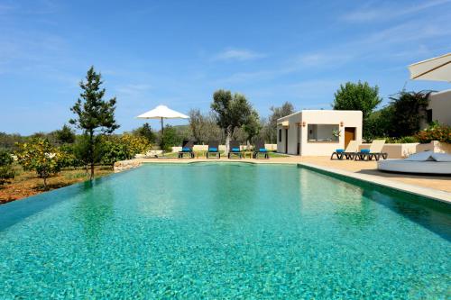 a swimming pool in a villa at Villa Luna in Sant Joan de Labritja