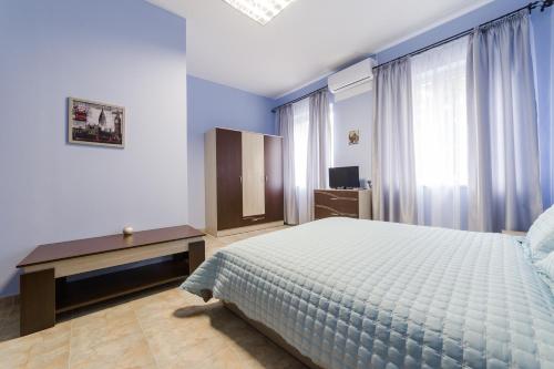 Ένα ή περισσότερα κρεβάτια σε δωμάτιο στο Семеен хотел Пауталия