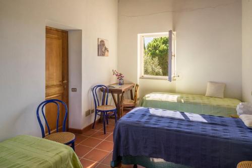 A bed or beds in a room at Case Danesi