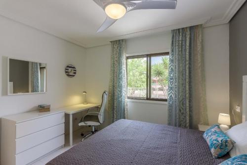 A bed or beds in a room at El Cardon 1A003