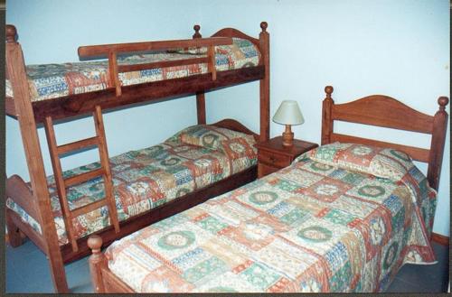 Una cama o camas cuchetas en una habitación  de Juana Pinamar