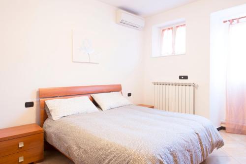 Ένα ή περισσότερα κρεβάτια σε δωμάτιο στο Casa NUVOLA alle Cinque Terre (CITRA 011017-LT-0066)