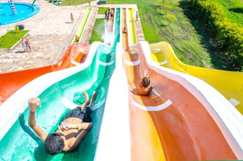 two children on a water slide at a water park at Gran Texier Hotel Casino in Concepción del Uruguay
