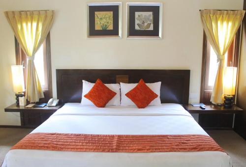 Ein Bett oder Betten in einem Zimmer der Unterkunft Gardenia Resort and Spa