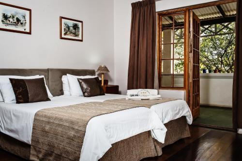 Postel nebo postele na pokoji v ubytování Okiep Country Hotel