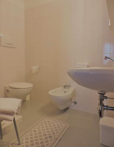 Um banheiro em Hotel Zeni