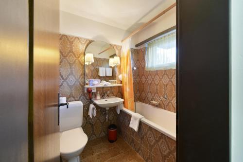 Bilik mandi di Schlosshotel - Self Check-In Hotel