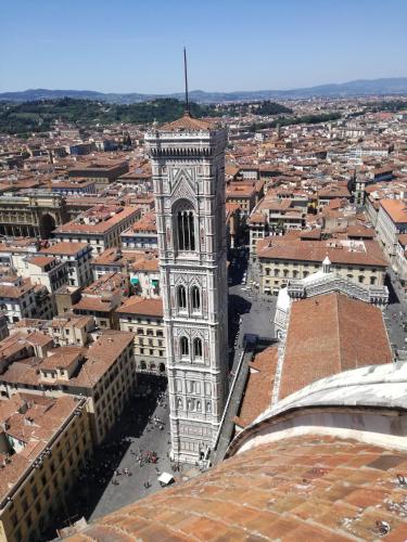 an aerial view of a clock tower in a city at Dimora Pieri in Florence