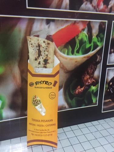 a packet of tofu next to a bowl of food at Green Lake View - Tower E 59 Acuan Laundry Time in Pondokcabe Hilir
