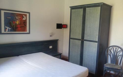 Letto o letti in una camera di La Casetta di Sara