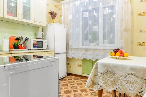 Кухня или мини-кухня в Apartment TwoPillows on Lenina 36 