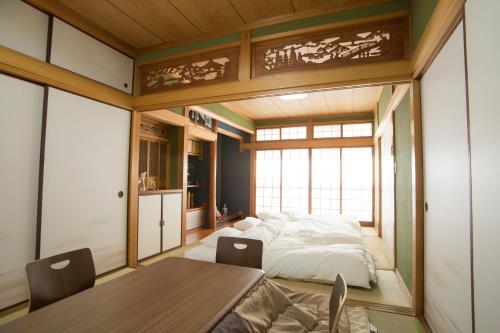 Afbeelding uit fotogalerij van Guest House DOUGO-YADO in Matsuyama