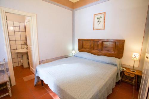 A bed or beds in a room at Bilo Sant'Anna con vista piscina