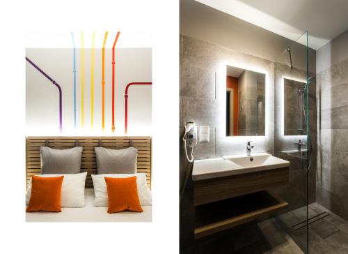 a bathroom with a sink and a mirror at ibis Styles Warszawa City in Warsaw