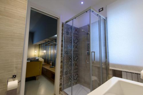 a bathroom with a shower and a sink at Un B&B al Belvedere in Enna