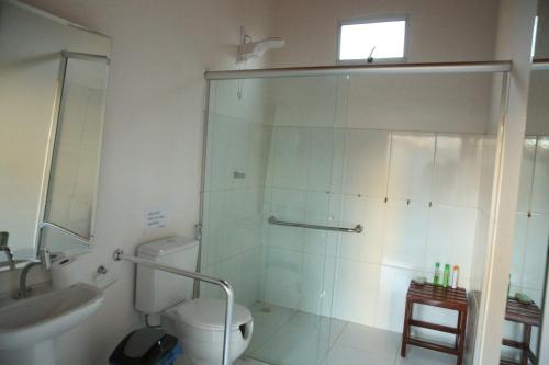 Um banheiro em Savana Hostel