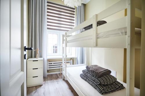 Posteľ alebo postele v izbe v ubytovaní Ropemaker Street Apartment