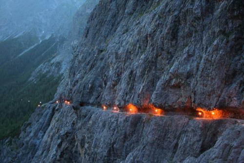a mountain road with cars on it at night at Unterlutaschg-Chalet Appartement am Hof in Slingia
