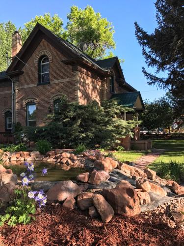 a house with a rock garden in front of it at Monroe Inn in Monroe