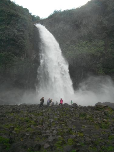 a group of people standing in front of a waterfall at Hostal La Casa De Rodrigo in Baeza