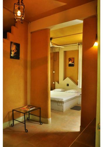 Ένα ή περισσότερα κρεβάτια σε δωμάτιο στο Ambalama Leisure Lounge