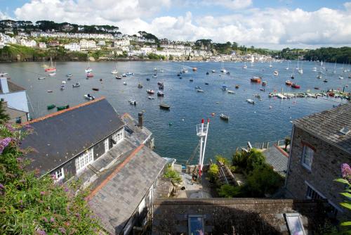 a view of a harbor with boats in the water at Polmarine in Polruan